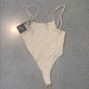 Small yellow and white onesie